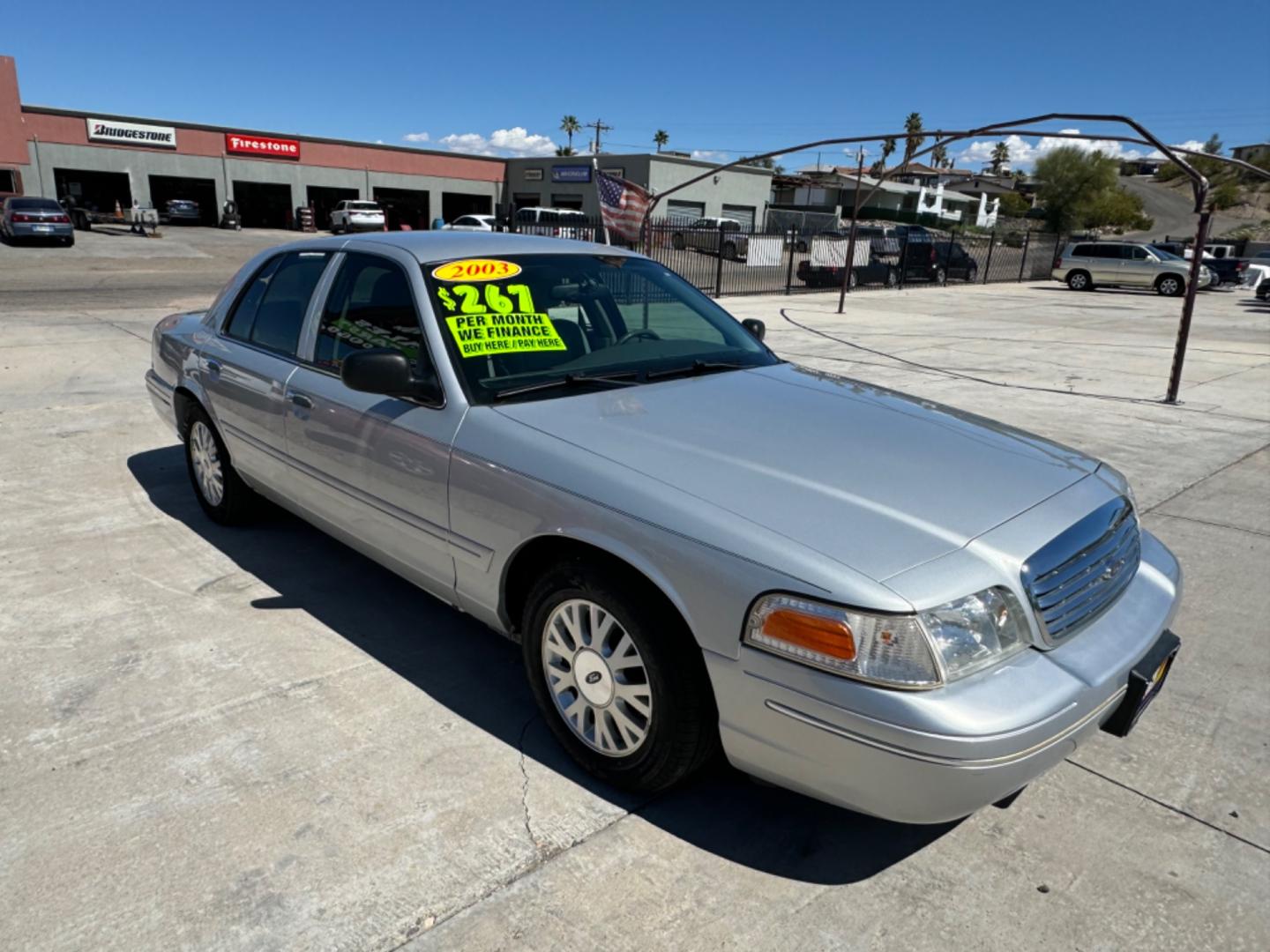 2003 Silver Ford Crown Victoria (2FAFP74W53X) , located at 2190 Hwy 95, Bullhead City, AZ, 86442, (928) 704-0060, 0.000000, 0.000000 - 2003 Ford Crown Victoria LX 2 owner clean title. Super clean. Completely serviced. ice cold a/c. Free Warranty. In house financing. - Photo#0